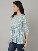 Woman wearing a grey indian kurti for women by Nishtha Chadda