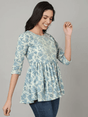 Woman wearing a grey indian kurti for women by Nishtha Chadda
