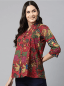 Woman wearing a brown indian kurti for women by Nishtha Chadda