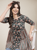 Woman wearing a brown indian kurti for women by Nishtha Chadda
