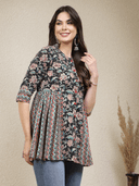 Woman wearing a brown indian kurti for women by Nishtha Chadda