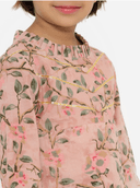 Woman wearing a grey indian kurti for women by Nishtha Chadda