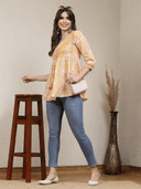 Woman wearing a grey indian kurti for women by Nishtha Chadda