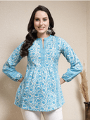 Woman wearing a grey indian kurti for women by Nishtha Chadda