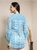Woman wearing a grey indian kurti for women by Nishtha Chadda
