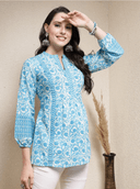 Woman wearing a grey indian kurti for women by Nishtha Chadda