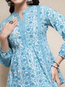 Woman wearing a grey indian kurti for women by Nishtha Chadda
