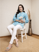 Woman wearing a grey indian kurti for women by Nishtha Chadda