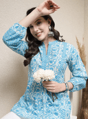 Woman wearing a grey indian kurti for women by Nishtha Chadda