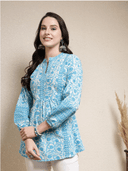 Woman wearing a grey indian kurti for women by Nishtha Chadda