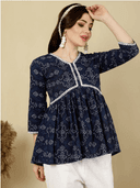 Woman wearing a brown indian kurti for women by Nishtha Chadda