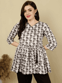 Woman wearing a brown indian kurti for women by Nishtha Chadda