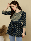 Woman wearing a brown indian kurti for women by Nishtha Chadda