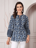 Woman wearing a grey indian kurti for women by Nishtha Chadda