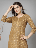 Woman wearing a grey indian kurti for women by Nishtha Chadda