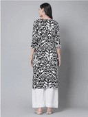 Woman wearing a grey indian kurti for women by Nishtha Chadda