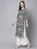 Woman wearing a grey indian kurti for women by Nishtha Chadda