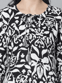 Woman wearing a grey indian kurti for women by Nishtha Chadda