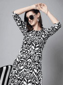 Woman wearing a grey indian kurti for women by Nishtha Chadda