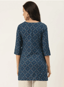 Woman wearing a olive indian kurti for women by Nishtha Chadda