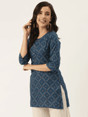 Woman wearing a olive indian kurti for women by Nishtha Chadda