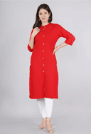 Woman wearing a red indian kurti for women by Nishtha Chadda