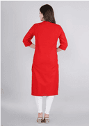 Woman wearing a red indian kurti for women by Nishtha Chadda