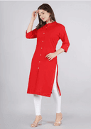 Woman wearing a red indian kurti for women by Nishtha Chadda