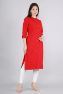 Woman wearing a red indian kurti for women by Nishtha Chadda