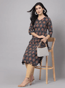 Woman wearing a red indian kurti for women by Nishtha Chadda