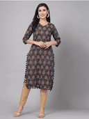 Woman wearing a red indian kurti for women by Nishtha Chadda