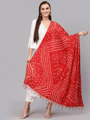 Woman wearing a brown indian kurti for women by Nishtha Chadda