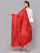 Woman wearing a brown indian kurti for women by Nishtha Chadda