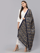 Woman wearing a brown indian kurti for women by Nishtha Chadda