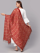 Woman wearing a brown indian kurti for women by Nishtha Chadda