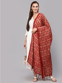Woman wearing a brown indian kurti for women by Nishtha Chadda