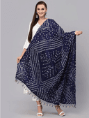 Woman wearing a brown indian kurti for women by Nishtha Chadda