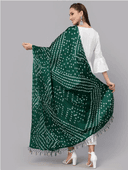 Woman wearing a brown indian kurti for women by Nishtha Chadda