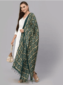 Woman wearing a brown indian kurti for women by Nishtha Chadda
