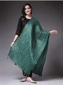 Woman wearing a red indian kurti for women by Nishtha Chadda