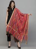 Woman wearing a red indian kurti for women by Nishtha Chadda