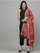 Woman wearing a red indian kurti for women by Nishtha Chadda