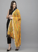 Woman wearing a red indian kurti for women by Nishtha Chadda