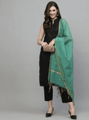 Woman wearing a red indian kurti for women by Nishtha Chadda