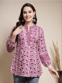 Woman wearing a brown indian kurti for women by Nishtha Chadda