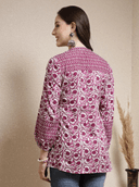 Woman wearing a brown indian kurti for women by Nishtha Chadda