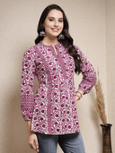 Woman wearing a brown indian kurti for women by Nishtha Chadda