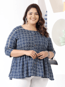 Woman wearing a maroon indian kurti for women by Nishtha Chadda
