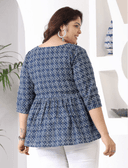 Woman wearing a maroon indian kurti for women by Nishtha Chadda