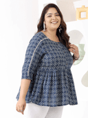 Woman wearing a maroon indian kurti for women by Nishtha Chadda